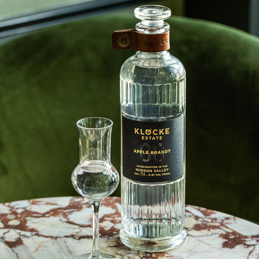 Klocke Estate 00 Apple Brandy bottle and glass